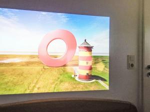 TV a/nebo společenská místnost v ubytování Holiday Home Klaffmuschel by Interhome