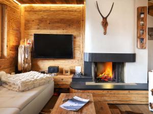 TV a/nebo společenská místnost v ubytování Apartment Praz 11 by Interhome + 20 fotografií
