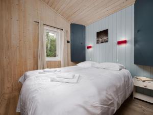 Postel nebo postele na pokoji v ubytování Holiday Home Granlien by Interhome