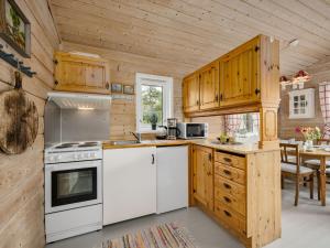 Kuchyň nebo kuchyňský kout v ubytování Holiday Home Granlien by Interhome