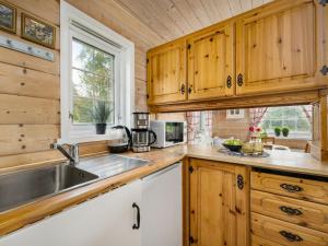 Kuchyň nebo kuchyňský kout v ubytování Holiday Home Granlien by Interhome