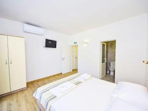 Posteľ alebo postele v izbe v ubytovaní Apartment Balota - Moreška-1 by Interhome