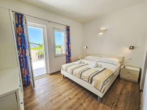 Posteľ alebo postele v izbe v ubytovaní Apartment Balota - Moreška-1 by Interhome