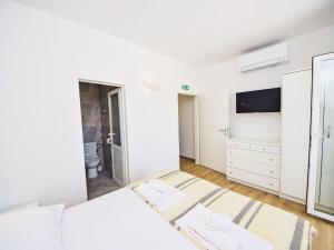 Posteľ alebo postele v izbe v ubytovaní Apartment Balota - Moreška-1 by Interhome