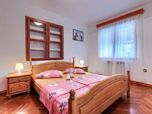 Postel nebo postele na pokoji v ubytování Holiday Home Edi by Interhome