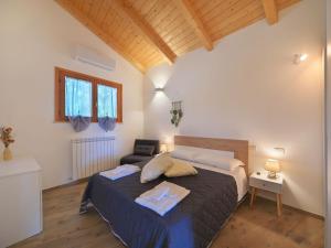 Rúm í herbergi á Chalet La Spiaggia by Interhome