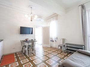 A television and/or entertainment centre at Apartment Aloe by Interhome