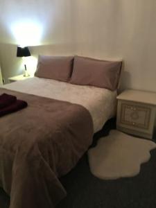 Ένα ή περισσότερα κρεβάτια σε δωμάτιο στο Beautiful 2 double bedrooms, 2 baths apartment