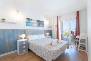 Katil atau katil-katil dalam bilik di Lopimar Playa Canet +22 gambar