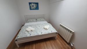 Postel nebo postele na pokoji v ubytování Prenočišča Center Mir In Dobro