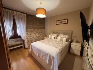Ein Bett oder Betten in einem Zimmer der Unterkunft Casita rural acogedora