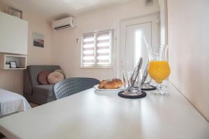 Nápoje v ubytování Studio Apartmani M + 13 fotografií