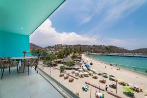 - un balcon offrant une vue sur la plage dans l'établissement 3044 - Playa Sur Santa Cruz 301, à Santa Cruz Huatulco