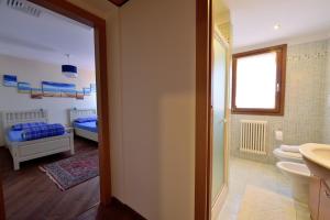 A bed or beds in a room at Ca' Dei Burci