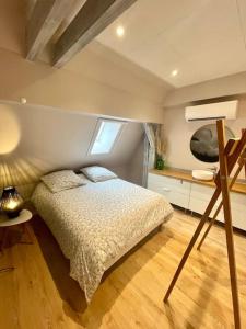 Ένα ή περισσότερα κρεβάτια σε δωμάτιο στο Appartement avec Sauna - Europa Park