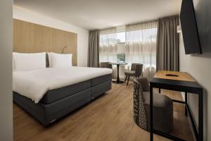 Postel nebo postele na pokoji v ubytování WestCord Art Hotel Amsterdam 4 stars