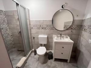 Kúpeľňa v ubytovaní Pacsirta Apartman Grand