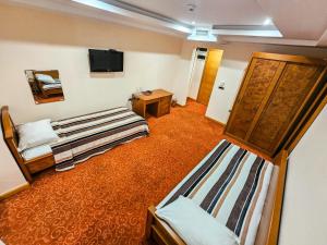 Mali Hotel BaMBiS客房内的一张或多张床位
