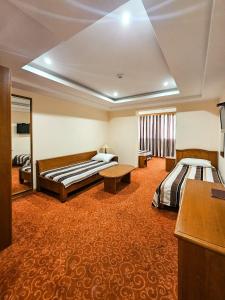 Mali Hotel BaMBiS客房内的一张或多张床位