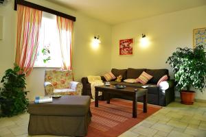 Posedenie v ubytovaní Villa D'Arsa