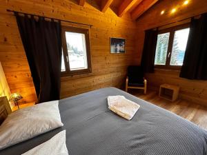 Postel nebo postele na pokoji v ubytování La Tzoum'hostel