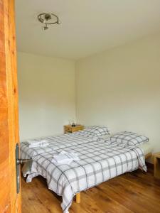 Postel nebo postele na pokoji v ubytování La Tzoum'hostel