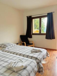 Postel nebo postele na pokoji v ubytování La Tzoum'hostel