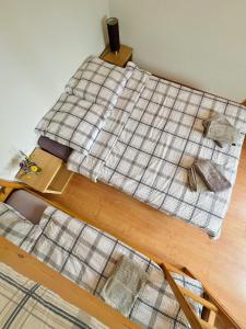 Postel nebo postele na pokoji v ubytování La Tzoum'hostel