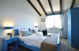 Posteľ alebo postele v izbe v ubytovaní Villa D'Arsa + 23 fotografií