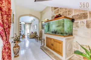 Foto sihtkohas Marsaskala asuva majutusasutuse Spacious 4BR Terraced House with Rooftop Access by 360 Estates galeriist