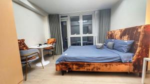 EG Private House -BGC UPTOWN客房内的一张或多张床位