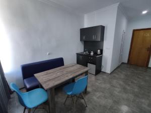 Kuchyň nebo kuchyňský kout v ubytování Hotel Talin