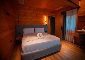 Hotel Shpija e Gjyshit客房内的一张或多张床位