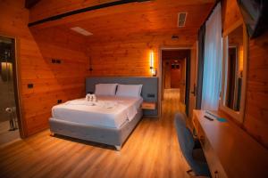 Hotel Shpija e Gjyshit客房内的一张或多张床位