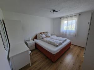 Posteľ alebo postele v izbe v ubytovaní Apartment Bergblick