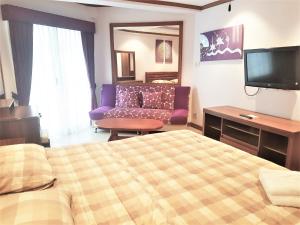 Postel nebo postele na pokoji v ubytování SeaView Floor 11 Jomtien Beach