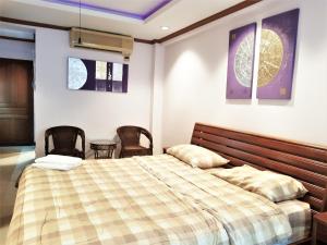 Postel nebo postele na pokoji v ubytování SeaView Floor 11 Jomtien Beach