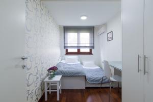 Ein Bett oder Betten in einem Zimmer der Unterkunft Apartment 18