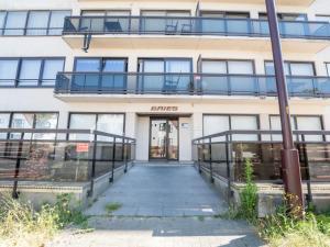 an external view of the entrance to a building at Studio Douceur de vivre nearby beach by Interhome in De Haan