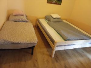 Posteľ alebo postele v izbe v ubytovaní Györgyök Háza