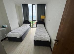 Katil atau katil-katil dalam bilik di Novel hotel