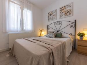 En eller flere senge i et værelse på Villa Soleil by Interhome