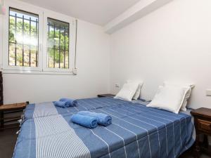 Postel nebo postele na pokoji v ubytování Holiday Home Los Pinos by Interhome
