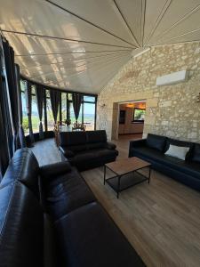 Część wypoczynkowa w obiekcie Villa Monbazillac, vue exceptionnelle, piscine, jacuzzi 10-12 pax