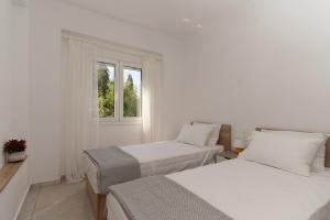 Onar House - Modern Stay in Nature客房内的一张或多张床位