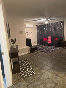 a living room with a couch and a table at Executive one bedroom apartment including pull out sofa bed in Antigonish