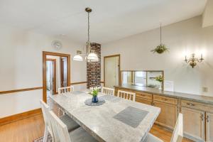 a kitchen and dining room with a table and chairs at 5 Mi to Hersheypark Family Home with Game Room in Annville