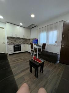Kuchyň nebo kuchyňský kout v ubytování Apartment MDrasa