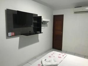 TV a/nebo společenská místnost v ubytování Lax Hotel - Acesso através de escadas - 3 andares