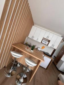 Khu vực ghế ngồi tại Apartman Dan i Noć